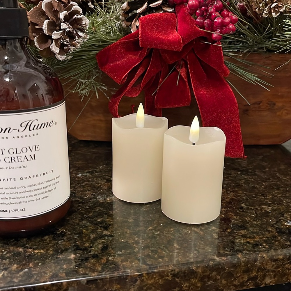 3 inch timer faux candles with some impact damage as pictured on wax